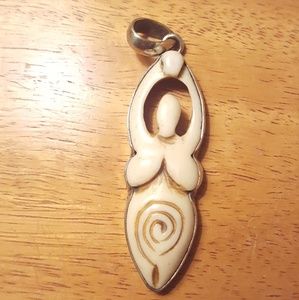 Bone and sterling silver artisan pendant